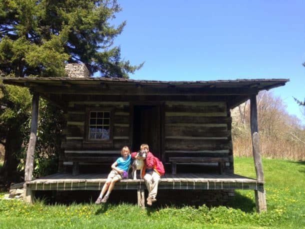 Kids with Josie in front of Ferguson Cabin