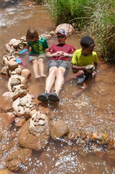 Larry and kids in creek
