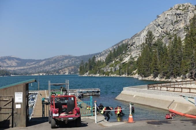 Divers entering water