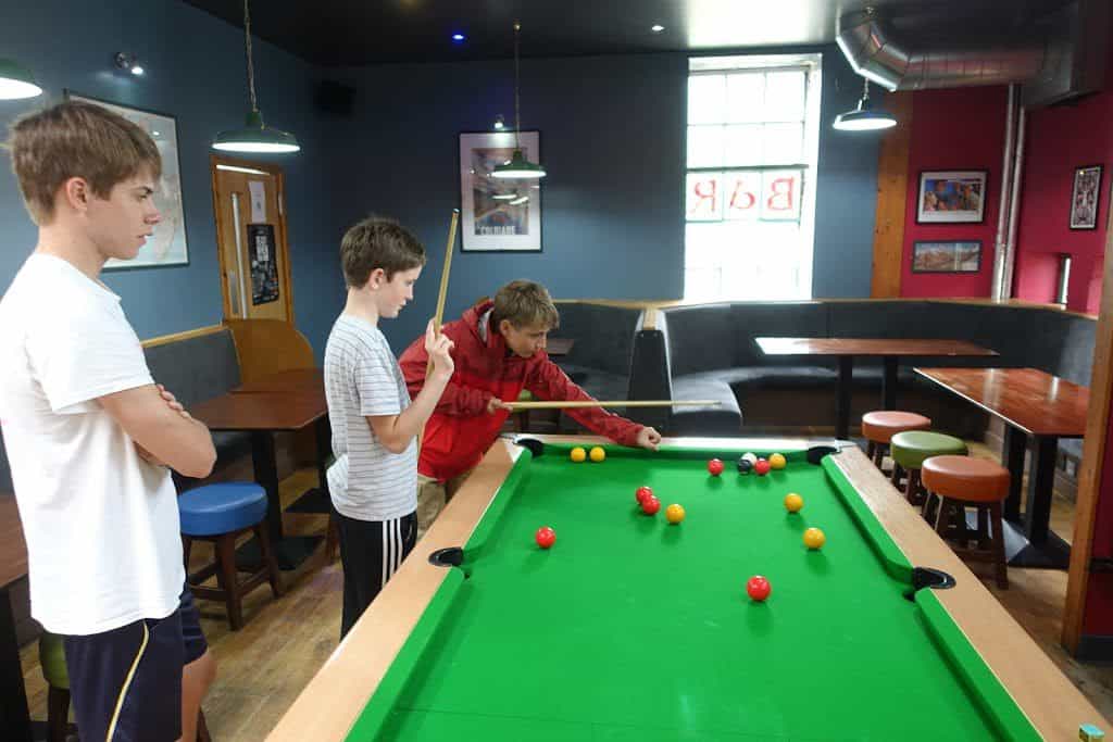 Kids playing pool