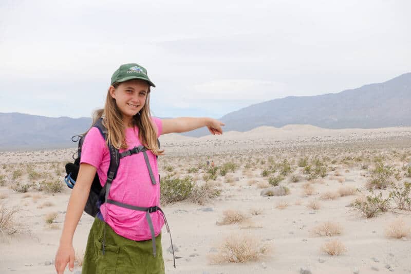 Paige pointing at Panamint Dunes