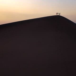 The kids on top of the dunes