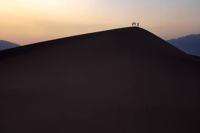 The kids on top of the dunes