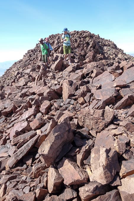 Kids scrambling on rocks